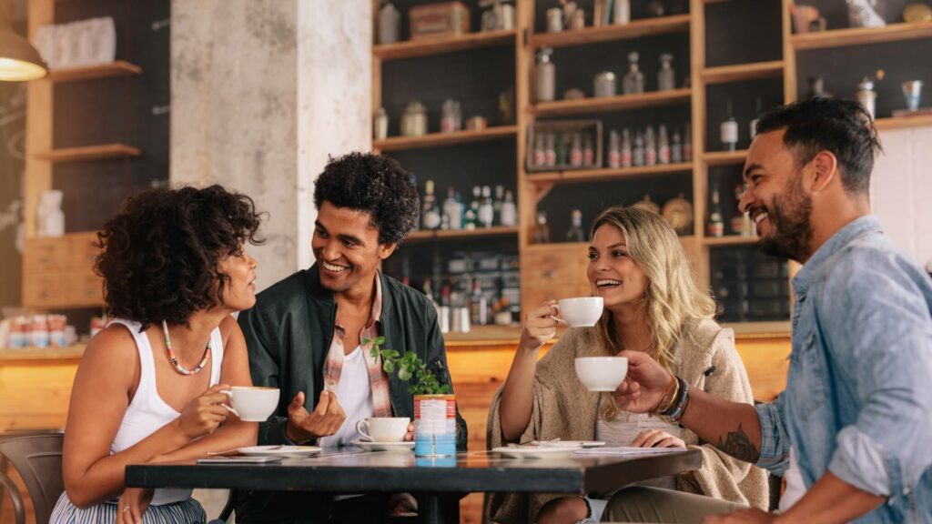 friends drinking coffee at a cafe